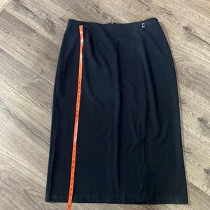 Black long skirt with split in the front.